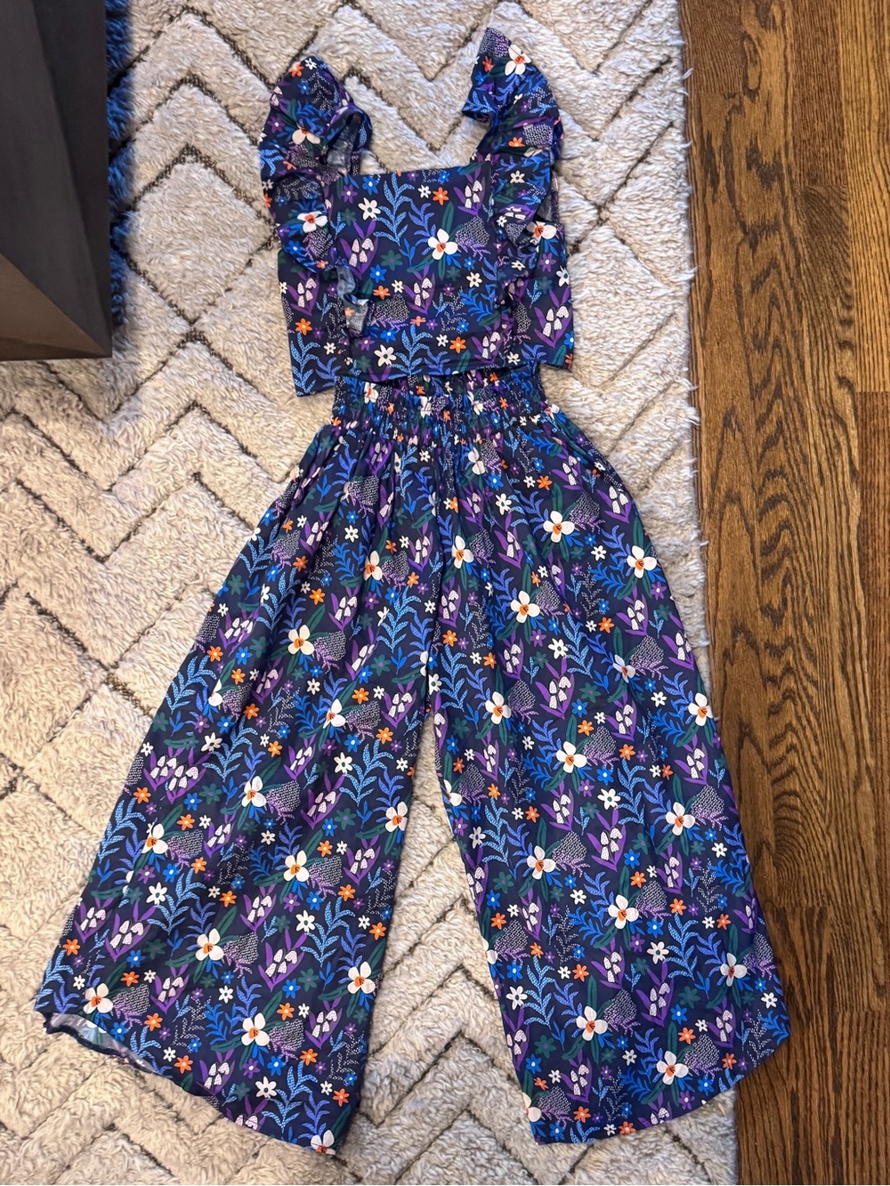 Minimalist Folk Co Floral Wide-Leg Jumpsuit with Ruffle Sleeve
